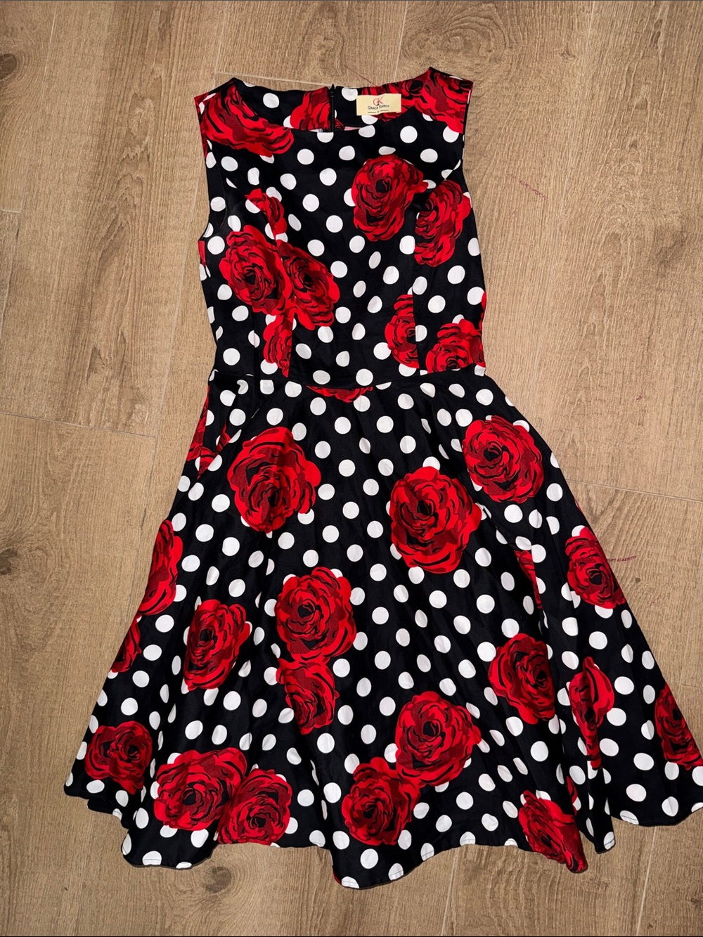 Woman’s Black Polka Dot Dress with Red Rose Print